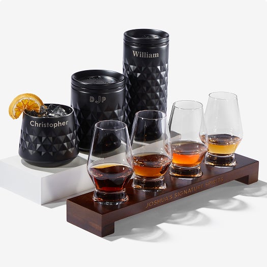 A Filled Glass Tumbler with the name 'Sullivan' on it