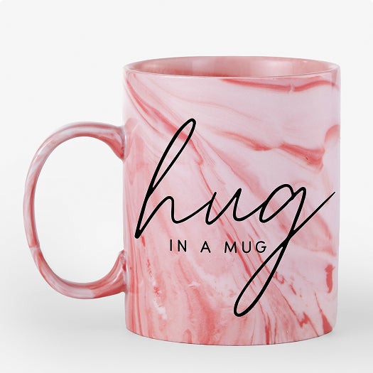 A Personalized Mug with a photo of a family smiling on it