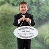 Ring Bearer holding sign