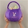 Product Thumbnail Holding Purple Bag