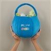 Product Thumbnail Holding Blue Bag