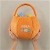 Product Thumbnail Holding Orange Bag