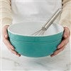 Turquois Bowl in Hands with Whisk