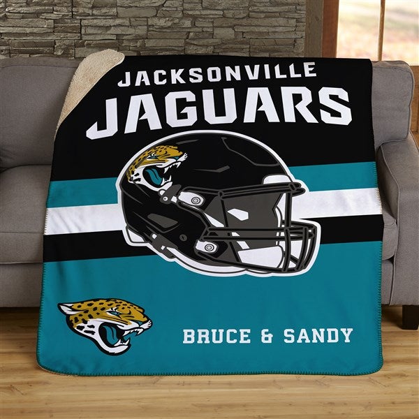 teal jaguars helmet